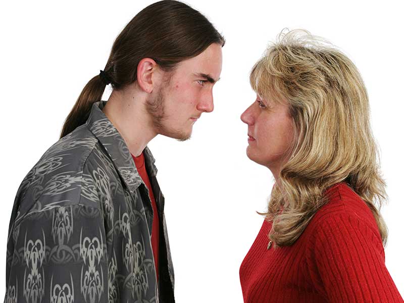 Male teen defying alienated mother